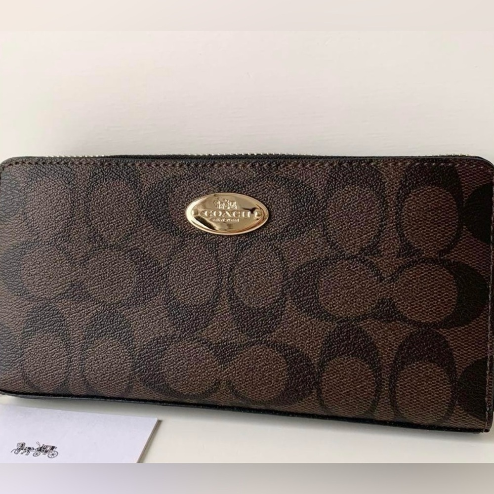 Coach Peyton black brown signature leather zip around wallet